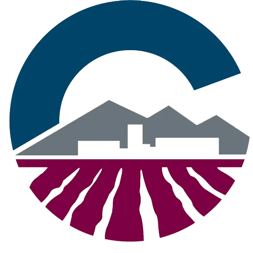 Logo of Pelican Pools featuring stylized mountains and a circular design, representing pool service and maintenance in Chandler, AZ.